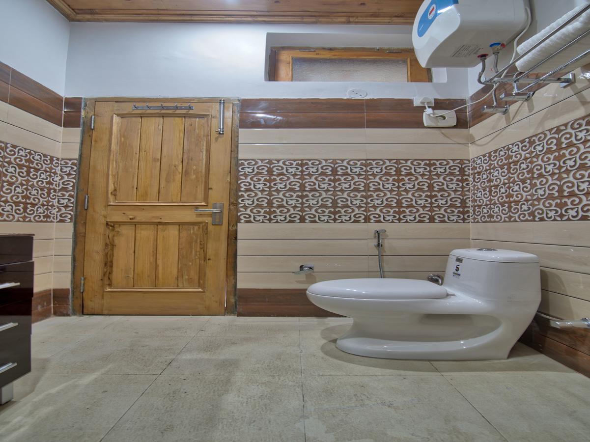 Oyo 13755 Woodstock Inn Dalhousie Bagian luar foto